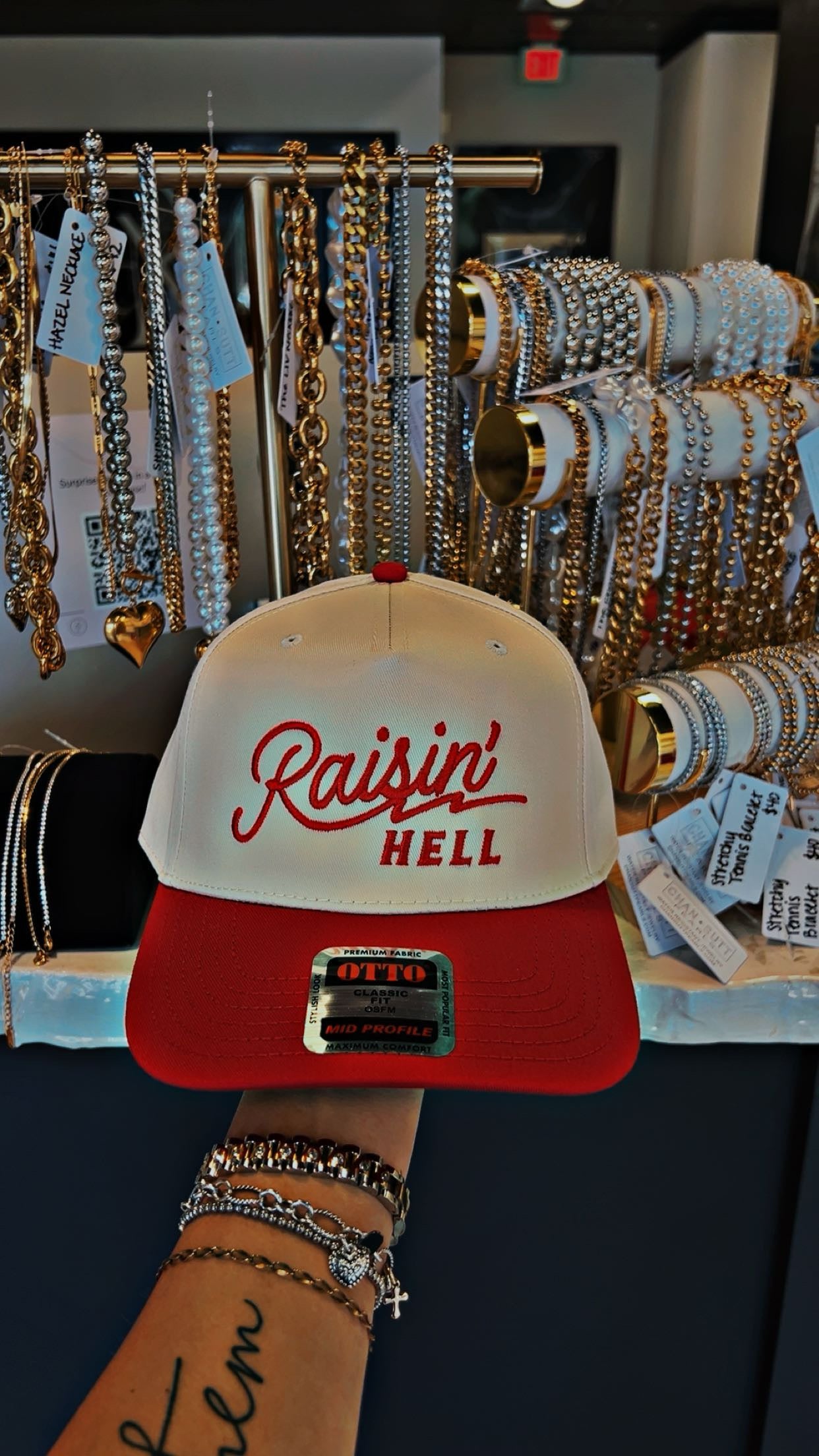 Raisin' Hell Trucker Hat- Cream & Red
