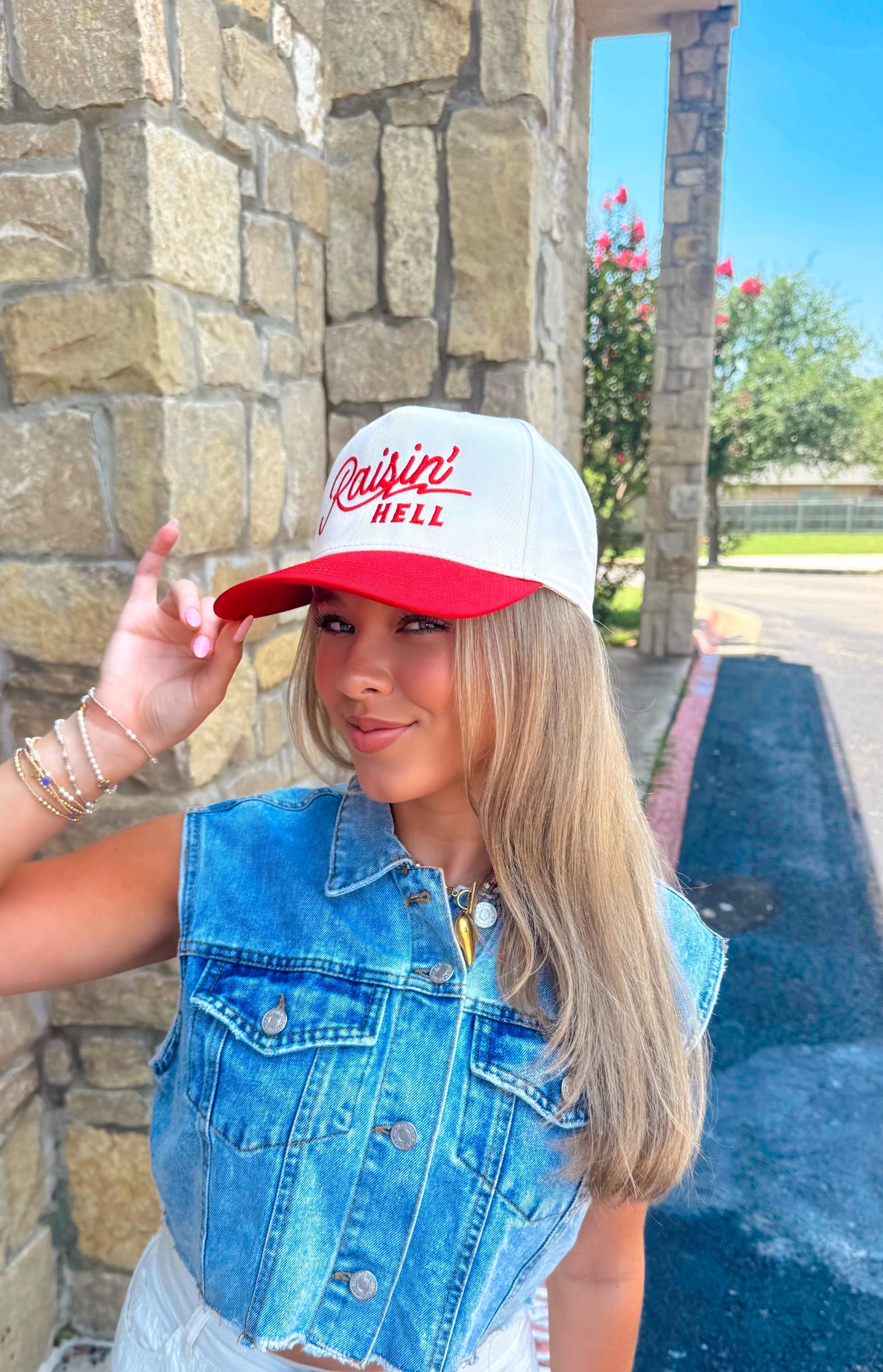 Raisin' Hell Trucker Hat- Cream & Red